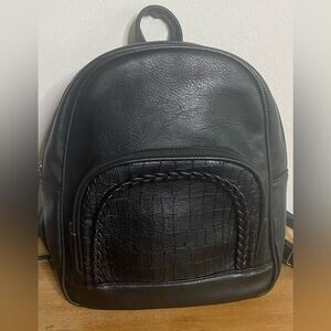 Sleek Black Faux Leather Backpack with Braided Accent